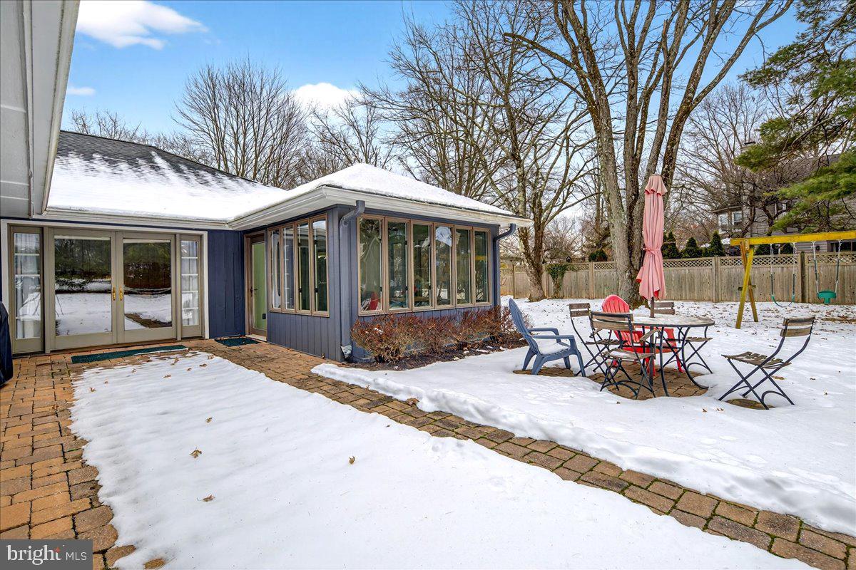 14 Baldwin Street Pennington, NJ 08534 - Photo 35 of 42 a view of a patio with table and chairs and potted plants