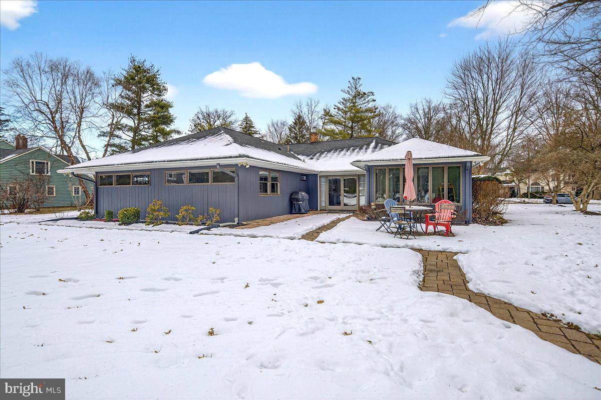 14 Baldwin Street Pennington, NJ 08534 - Photo 38 of 42 a view of a house with a yard and sitting area
