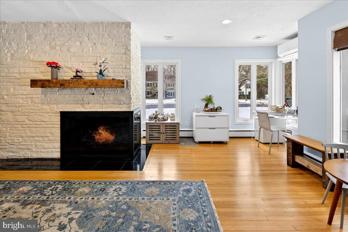 14 Baldwin Street Pennington, NJ 08534 - Photo 4 of 42 a living room with furniture and a fireplace