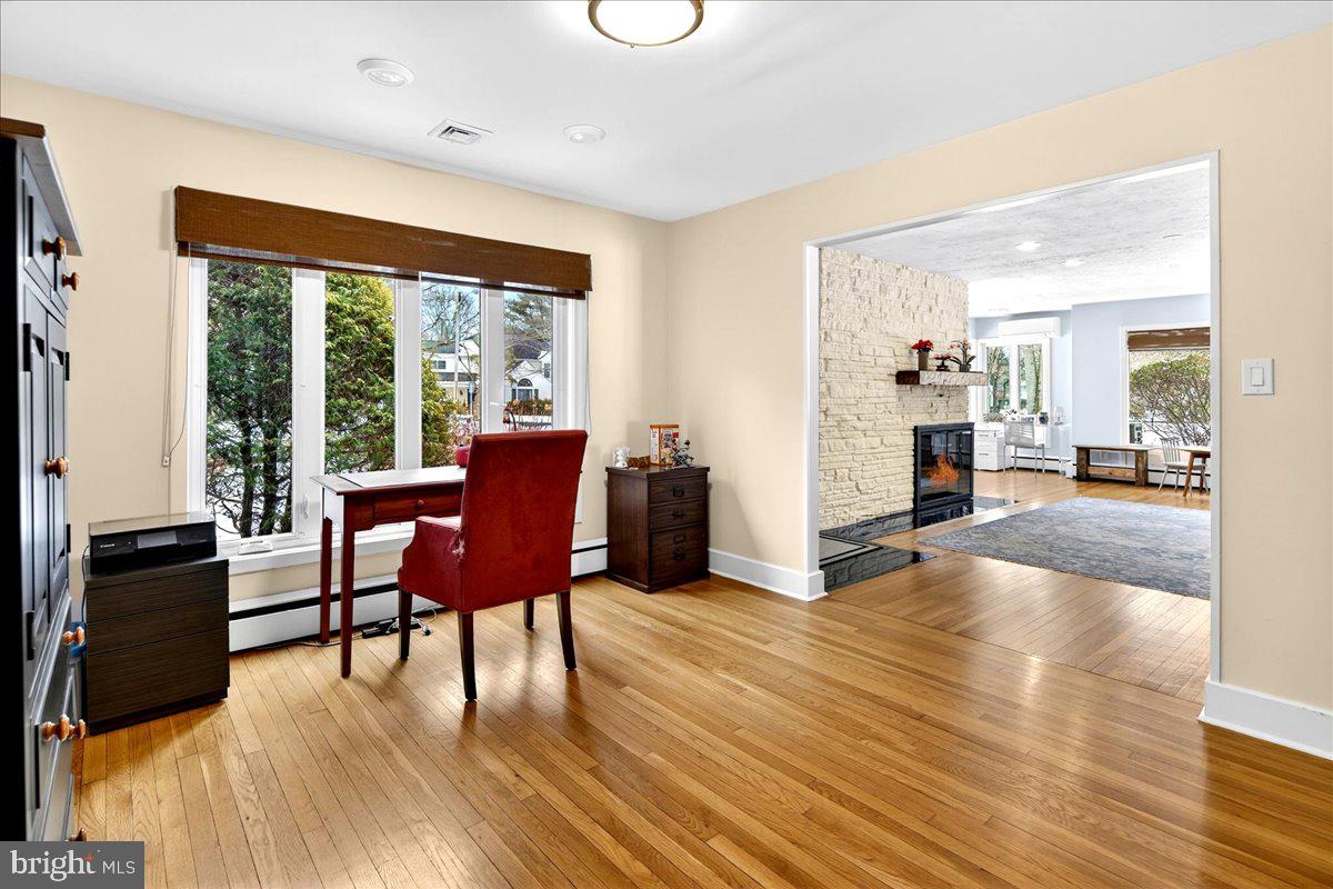 14 Baldwin Street Pennington, NJ 08534 - Photo 9 of 42 a view of a livingroom with furniture window and wooden floor