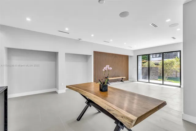 a workspace with furniture and window