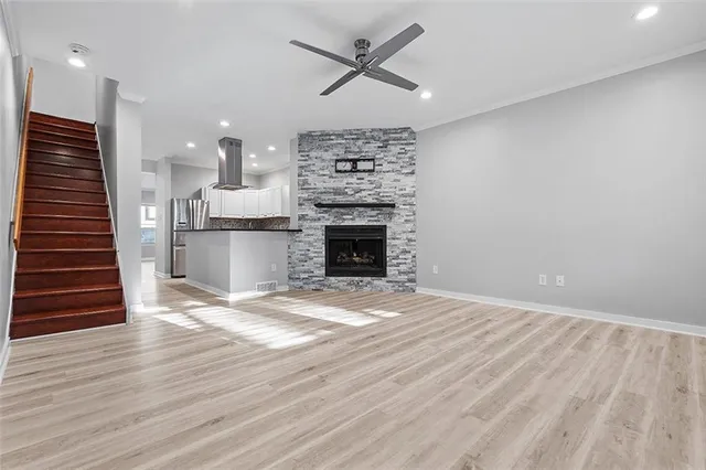 a view of an empty room with a window