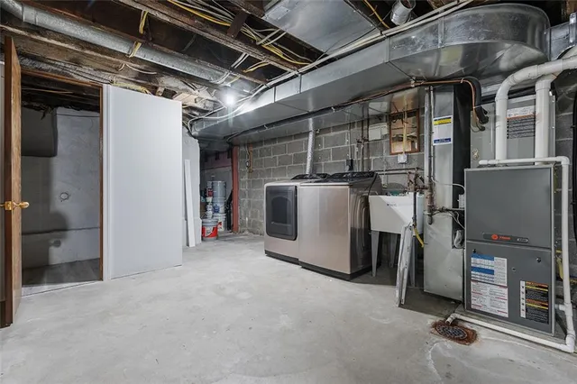 a aerial view of a house with a yard