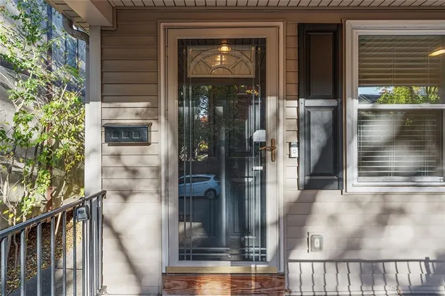 a view of a door of a house with a glass door