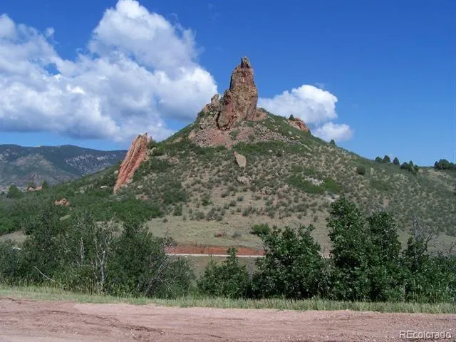 a view of an ocean and a mountain