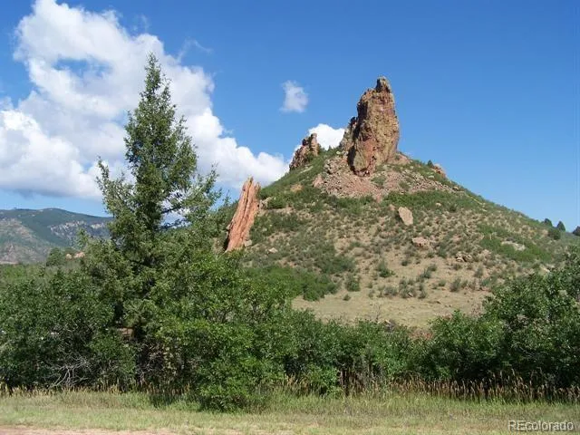 a view of a lake with a city