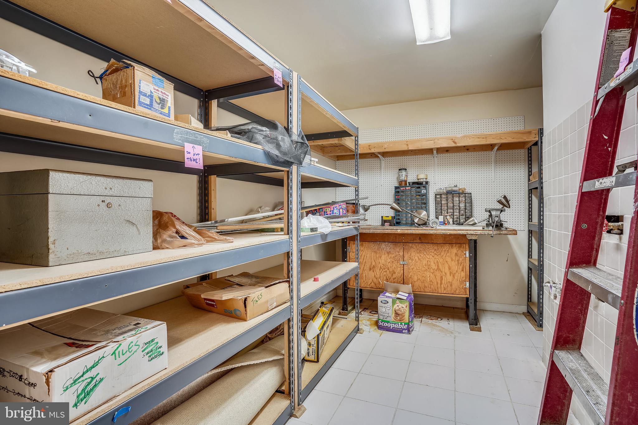 4409 Nuttall Road Fairfax, VA 22032 - Photo 55 of 80 Workshop with shelving for storage & W/D hookup.