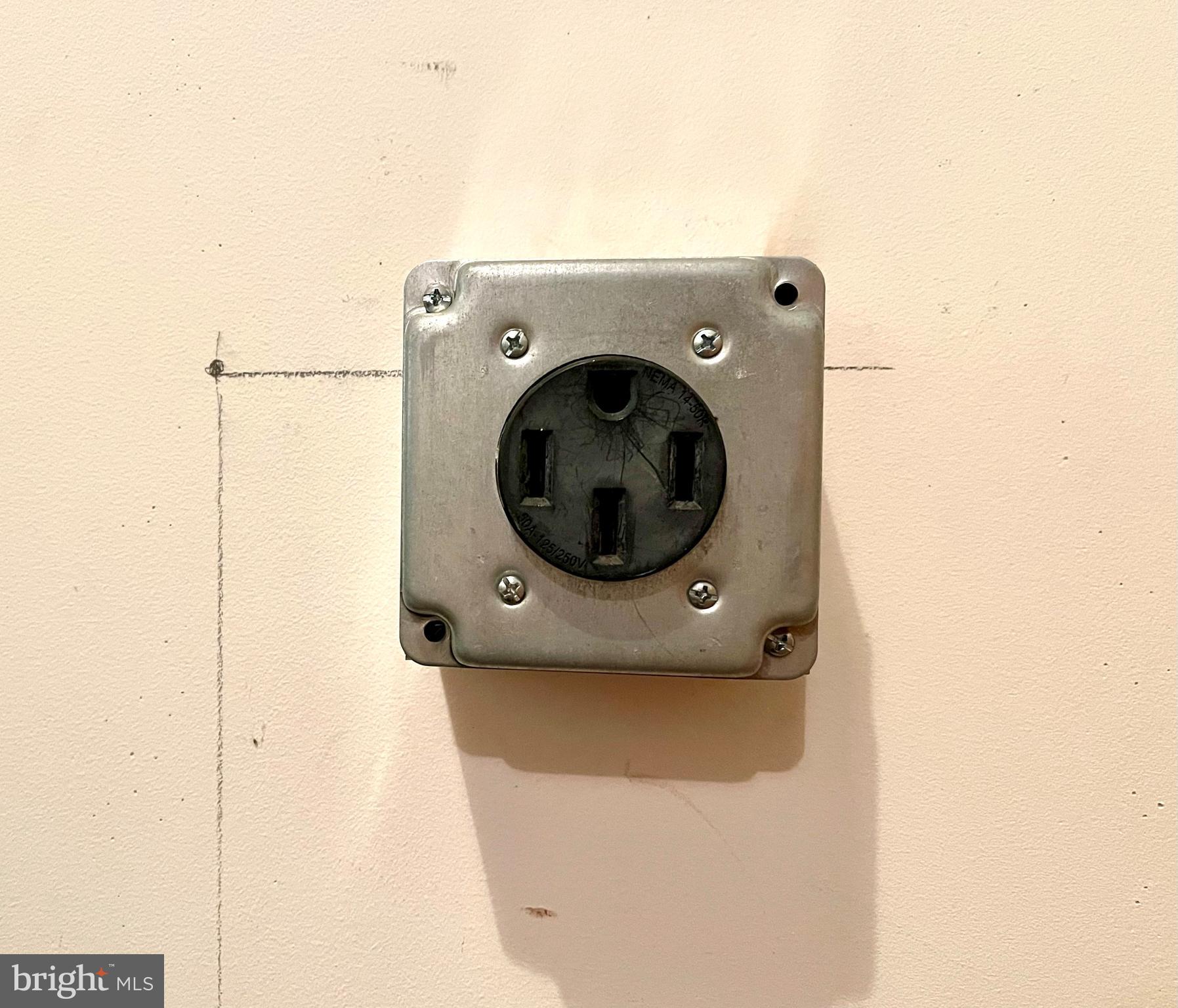 4409 Nuttall Road Fairfax, VA 22032 - Photo 56 of 80 Tesla charger in garage.