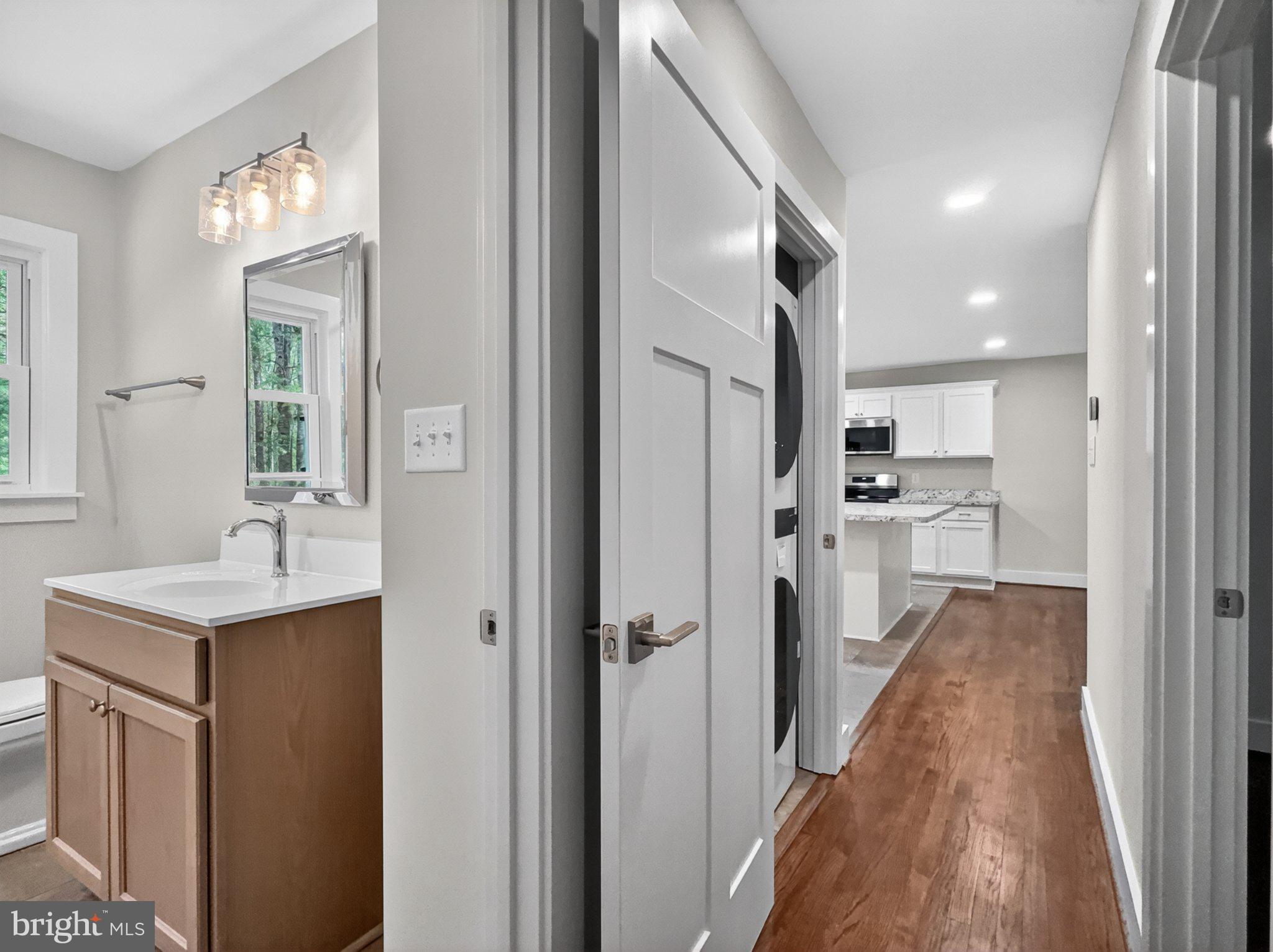 5408 Towles Mill Road Partlow, VA 22534 - Photo 16 of 24 Modern elegance in a bright hallway.