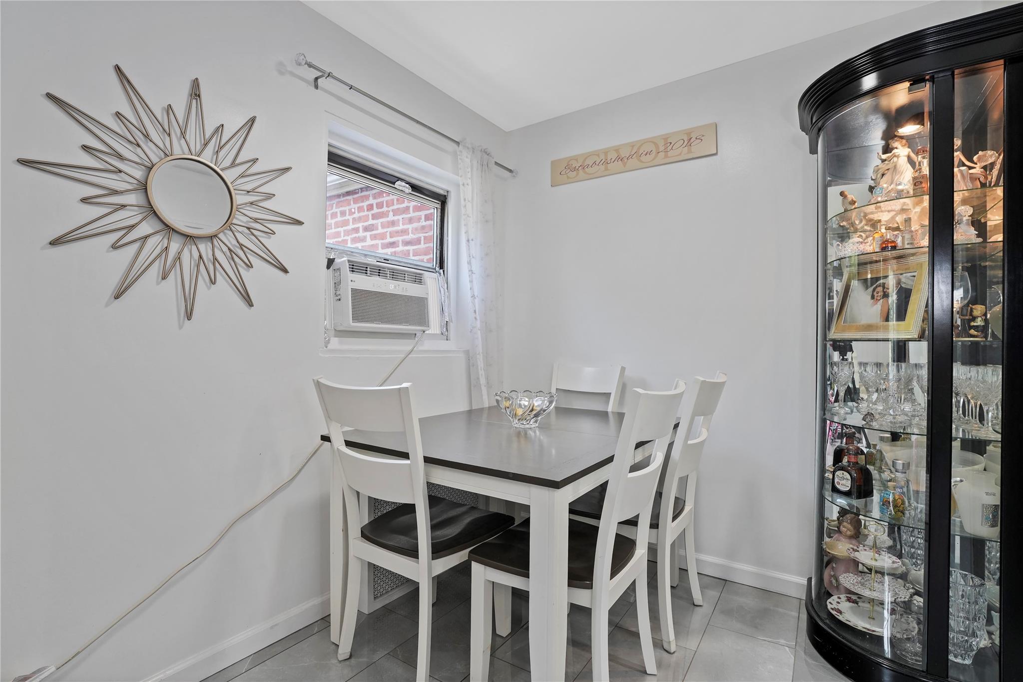1001 Shore Parkway, Unit 2B Brooklyn, NY 11228 - Photo 12 of 23 a view of a dining room with furniture window and outside view