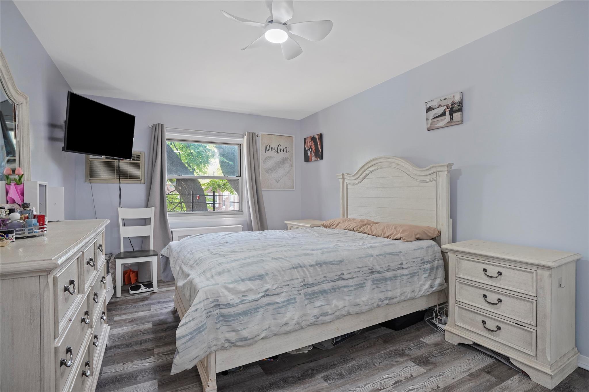 1001 Shore Parkway, Unit 2B Brooklyn, NY 11228 - Photo 13 of 23 a bedroom with a bed and a flat screen tv