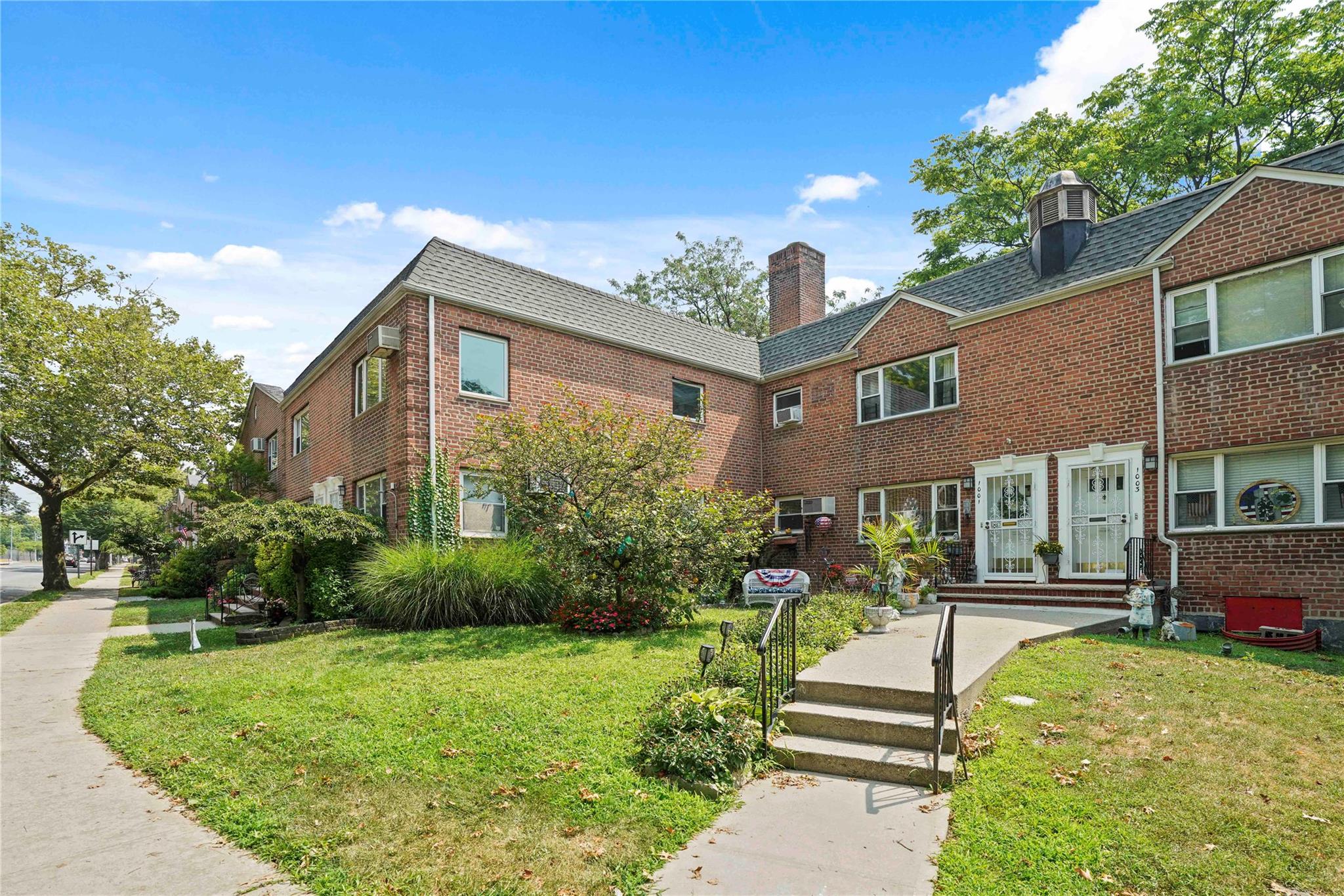 1001 Shore Parkway, Unit 2B Brooklyn, NY 11228 - Photo 21 of 23 a front view of a house with a yard