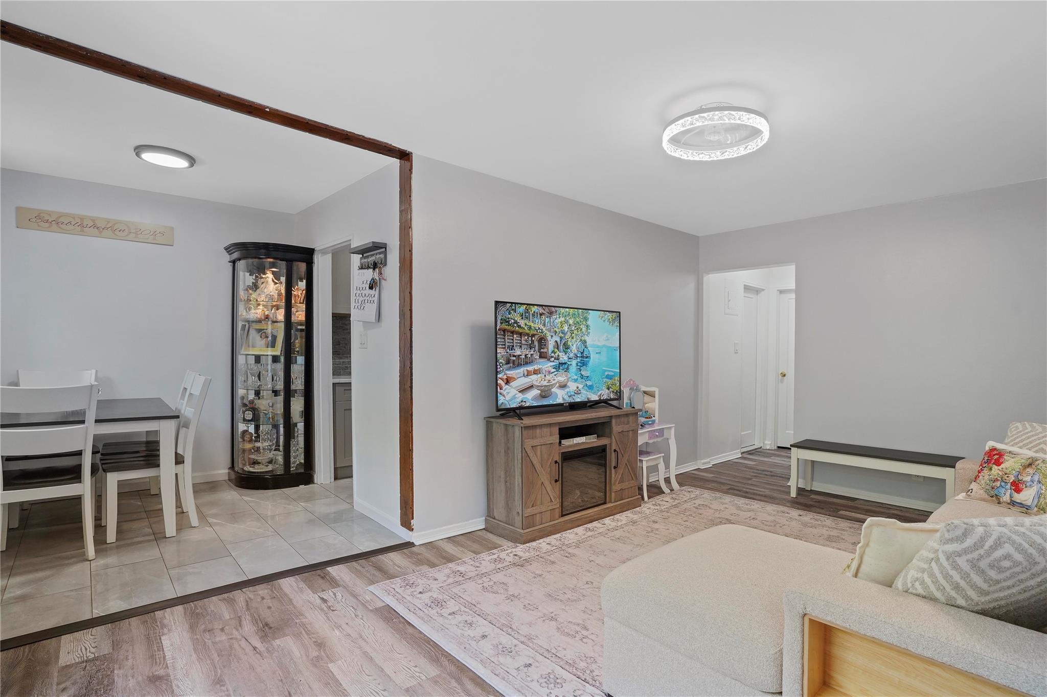 1001 Shore Parkway, Unit 2B Brooklyn, NY 11228 - Photo 3 of 23 a view of a livingroom with furniture and window