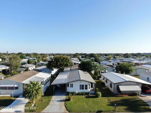 a aerial view of a town with big houses