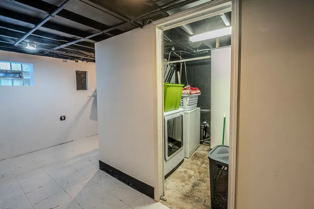 a kitchen with stainless steel appliances a refrigerator sink and cabinets