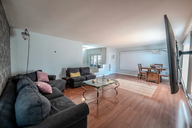 a view of a bathroom from a hallway