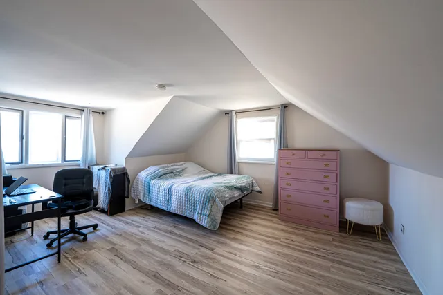 a bathroom with a toilet a sink and bathtub