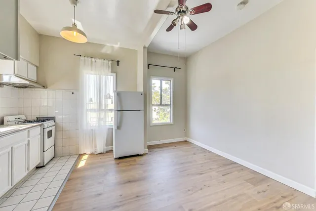 a kitchen with a sink and a window