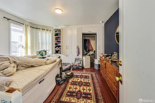 a kitchen with a refrigerator and a sink