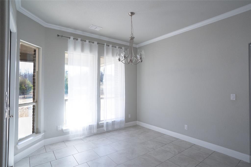 181 Fairview Court Decatur, TX 76234 - Photo 14 of 35 a view of an empty room with a window