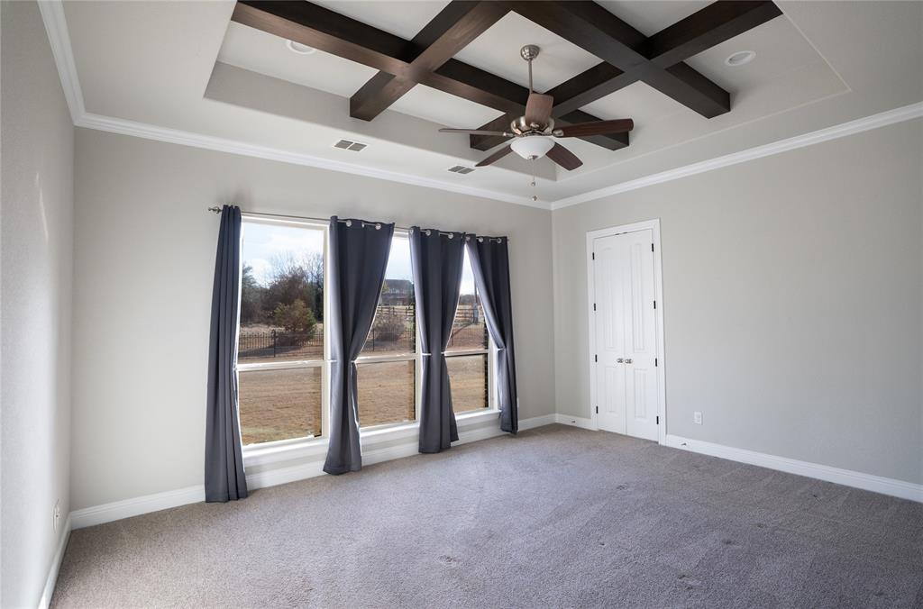 181 Fairview Court Decatur, TX 76234 - Photo 17 of 35 an empty room with windows