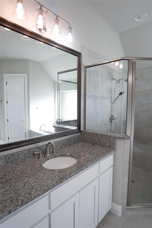 181 Fairview Court Decatur, TX 76234 - Photo 20 of 35 a bathroom with a granite countertop sink and mirror