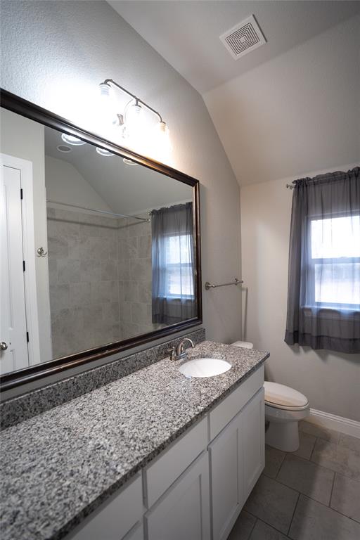 181 Fairview Court Decatur, TX 76234 - Photo 32 of 35 a bathroom with a sink and a mirror