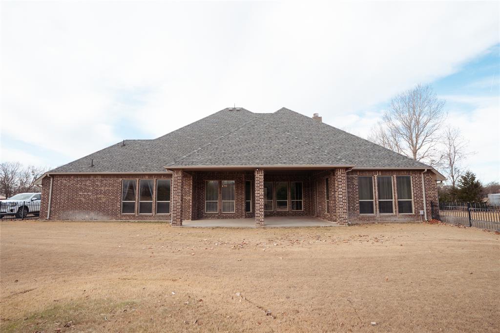 181 Fairview Court Decatur, TX 76234 - Photo 6 of 35 a house view with a outdoor space