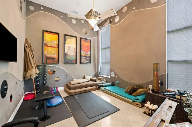 a room with furniture and a flat screen tv