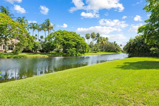 a view of a lake with a big yard