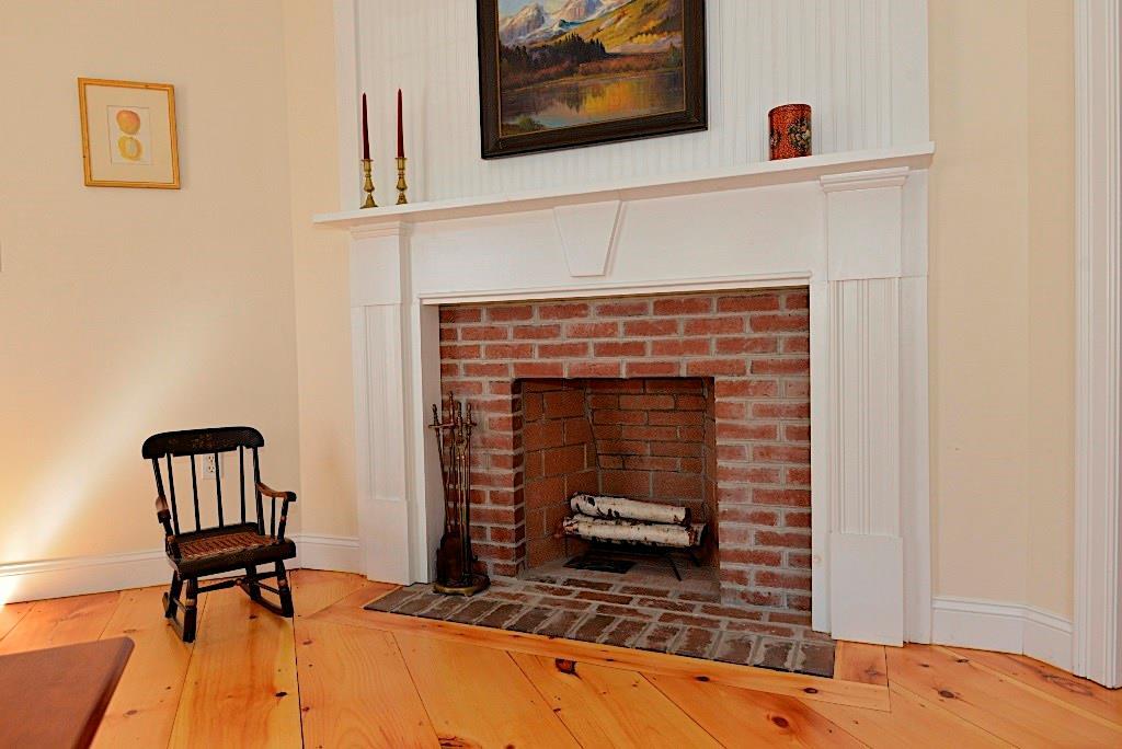 76 Tide Mill Road Portland, ME 04102 - Photo 9 of 33 Brick fireplace and mantel