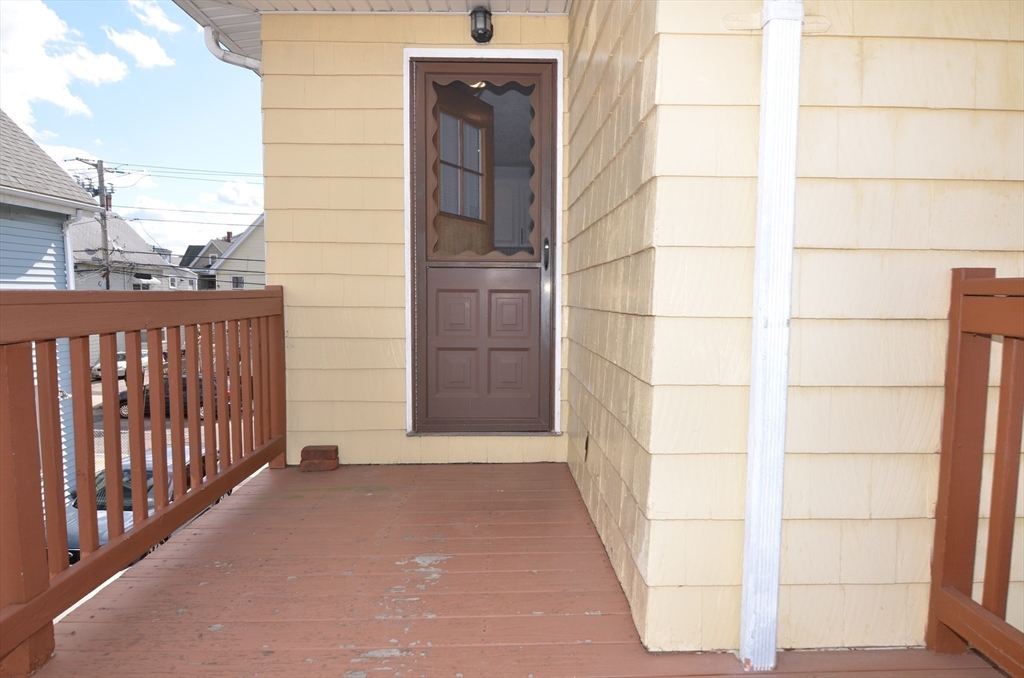 88 Cleveland Avenue, Unit 2 Everett, MA 02149 - Photo 13 of 23 a view of a wooden door