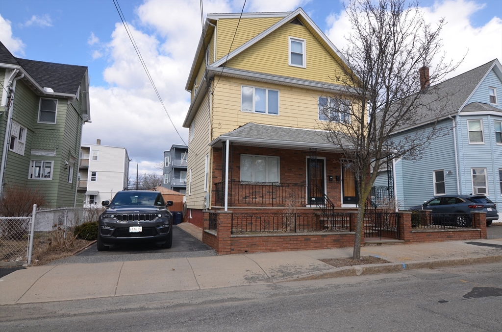 88 Cleveland Avenue, Unit 2 Everett, MA 02149 - Photo 23 of 23 a view of a car parked in front of a building