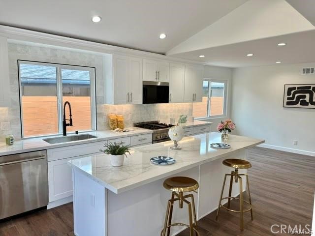 406 Calle Vista Torito San Clemente, CA 92672 - Photo 12 of 29 a kitchen with a sink stove and refrigerator