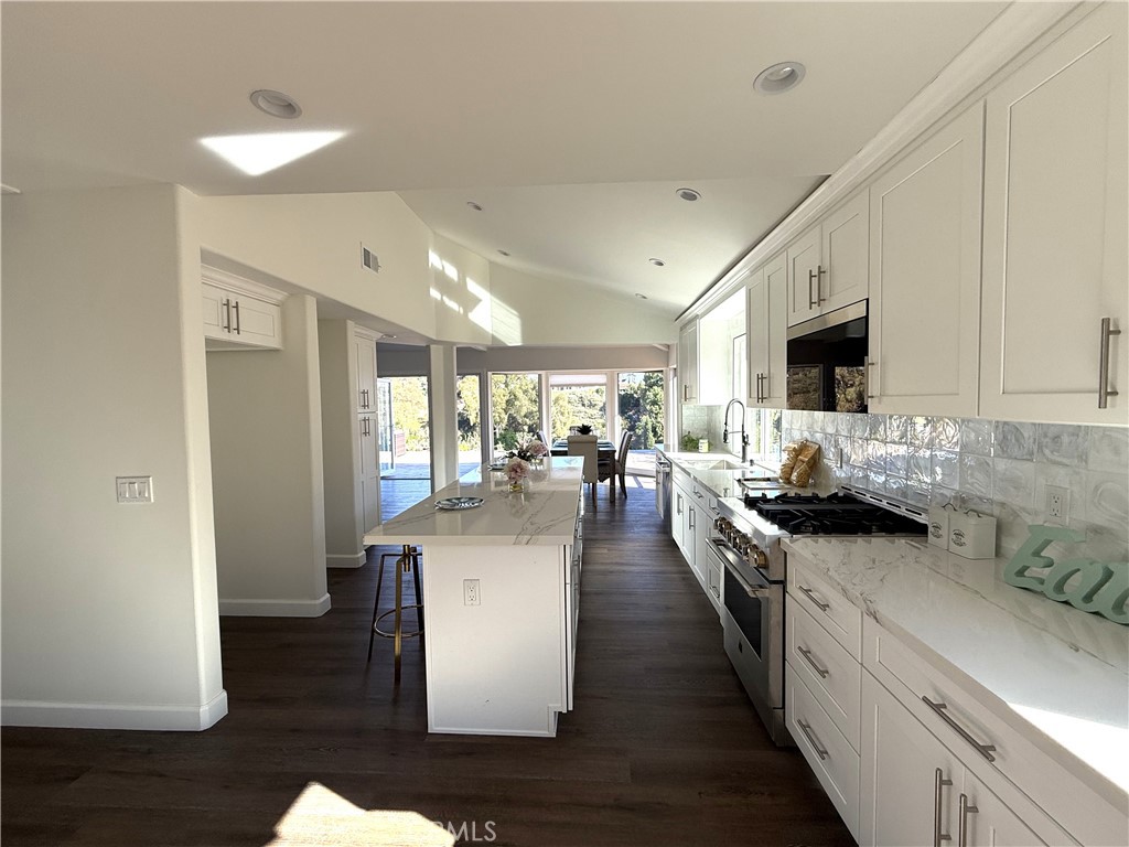 406 Calle Vista Torito San Clemente, CA 92672 - Photo 13 of 29 a kitchen with sink stove and refrigerator