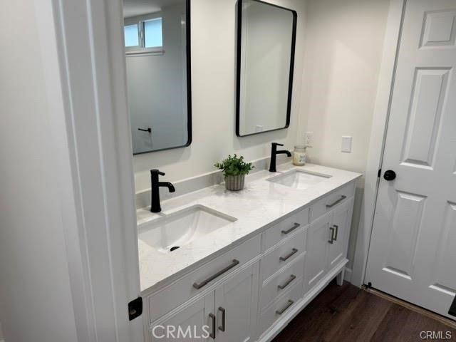 406 Calle Vista Torito San Clemente, CA 92672 - Photo 17 of 29 a bathroom with double vanity sink and two mirror