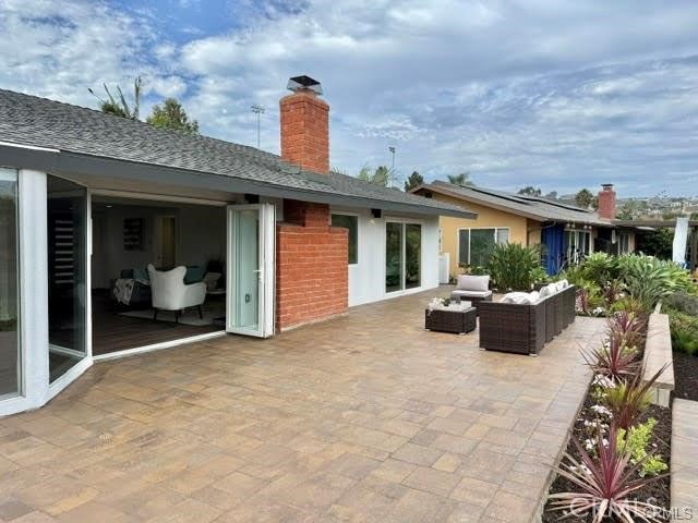 406 Calle Vista Torito San Clemente, CA 92672 - Photo 25 of 29 a view of a house with sitting area and furniture