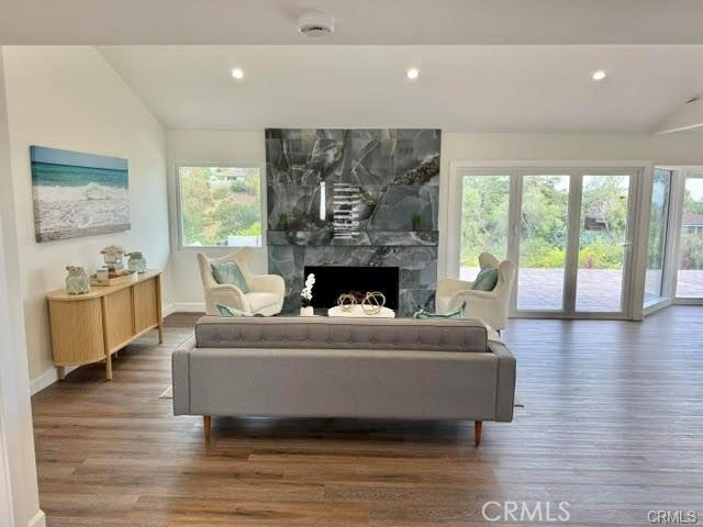 406 Calle Vista Torito San Clemente, CA 92672 - Photo 4 of 29 a living room with furniture and a fireplace