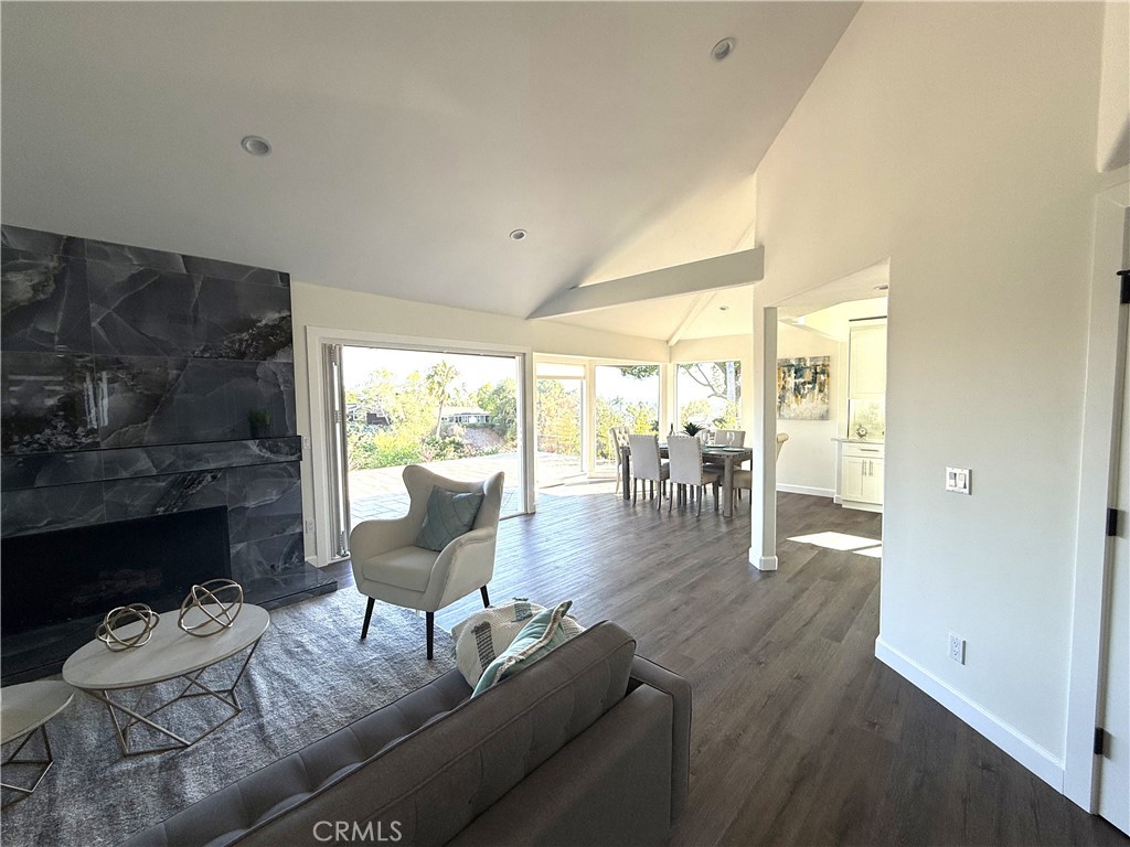406 Calle Vista Torito San Clemente, CA 92672 - Photo 5 of 29 a living room with furniture and a wooden floor
