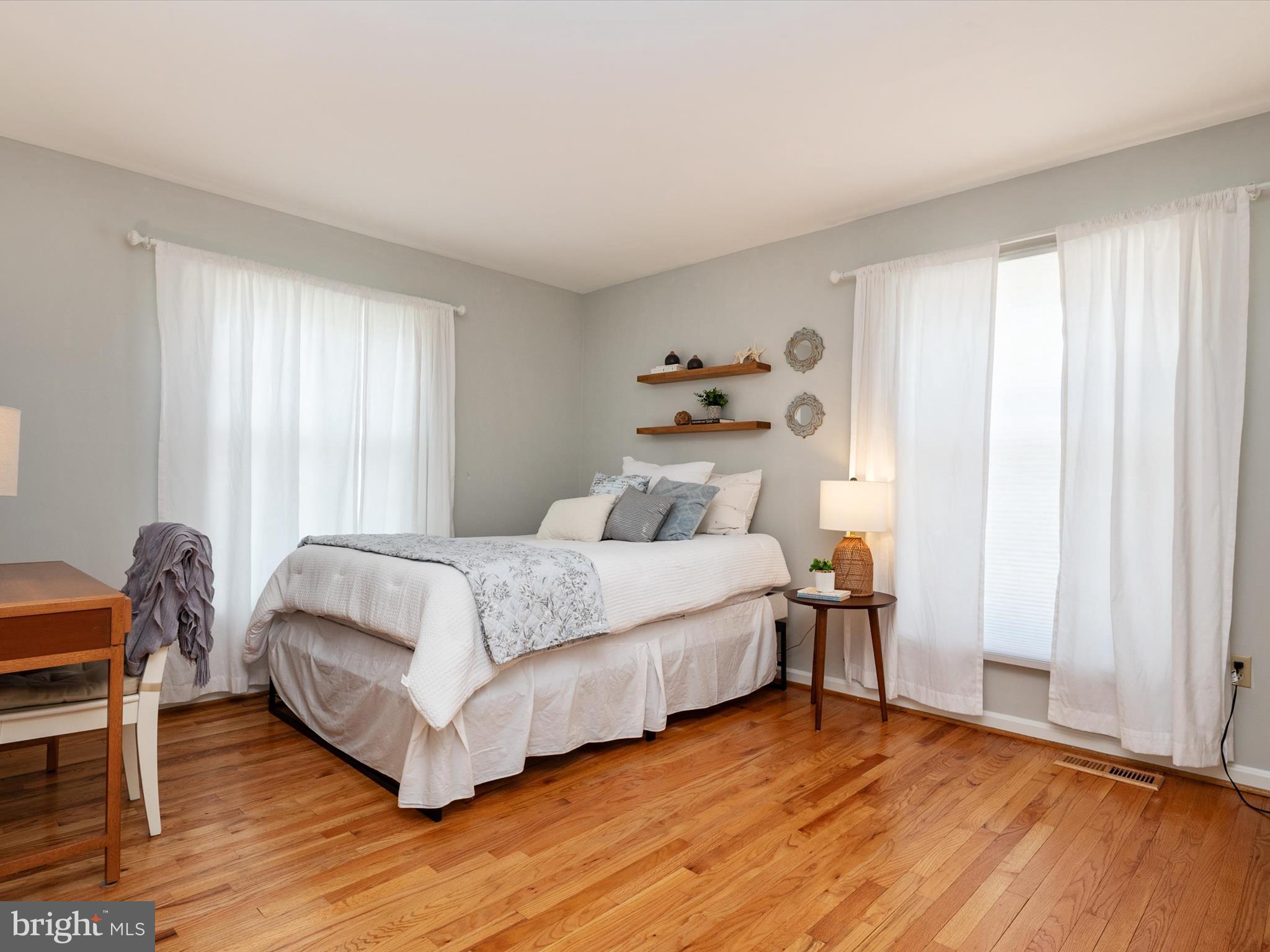 1589 Crofton Parkway Crofton, MD 21114 - Photo 19 of 60 a bedroom with a bed and a window