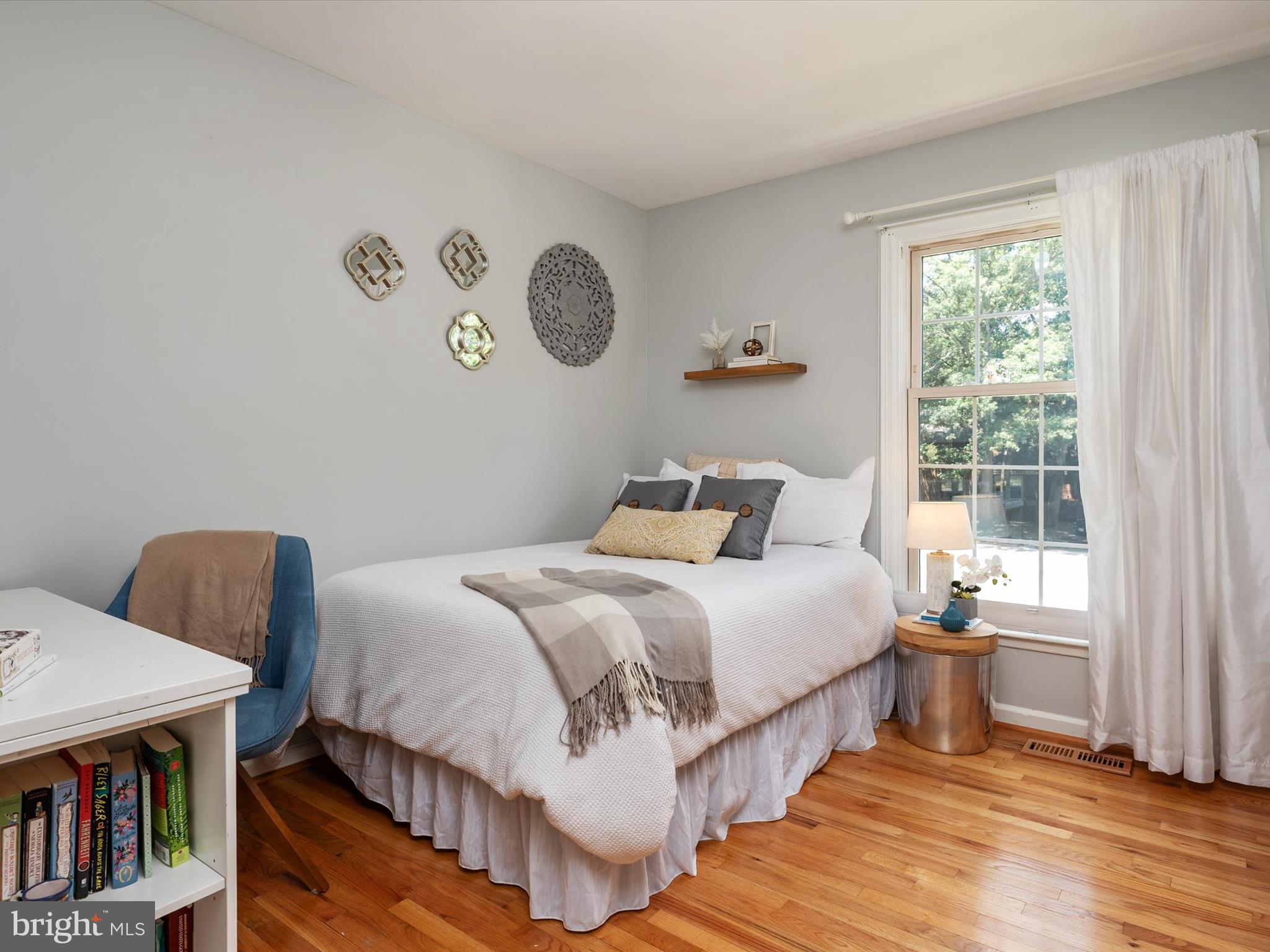 1589 Crofton Parkway Crofton, MD 21114 - Photo 21 of 60 a bedroom with a bed and a window