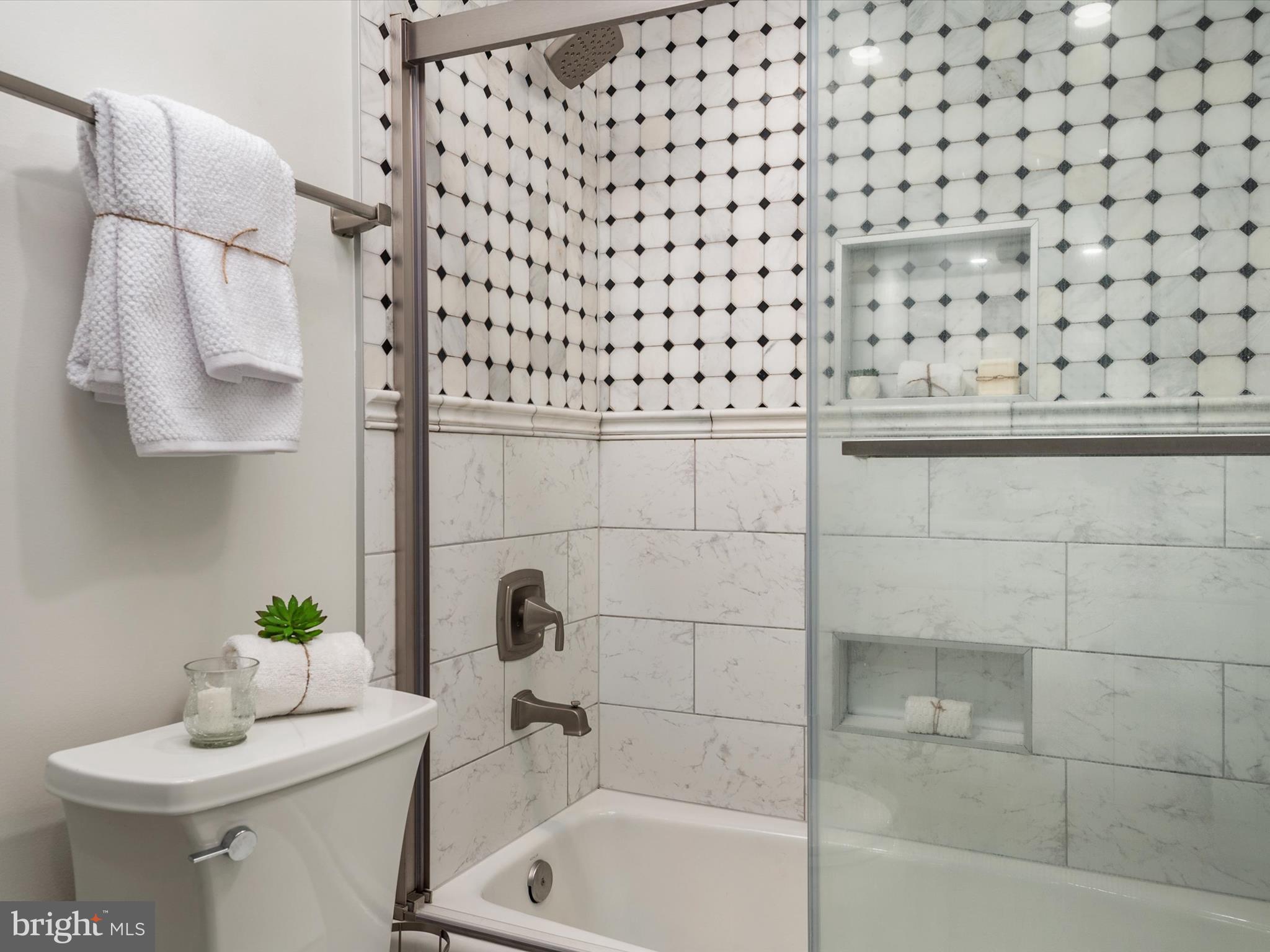 1589 Crofton Parkway Crofton, MD 21114 - Photo 24 of 60 a bathroom with a bathtub and a sink