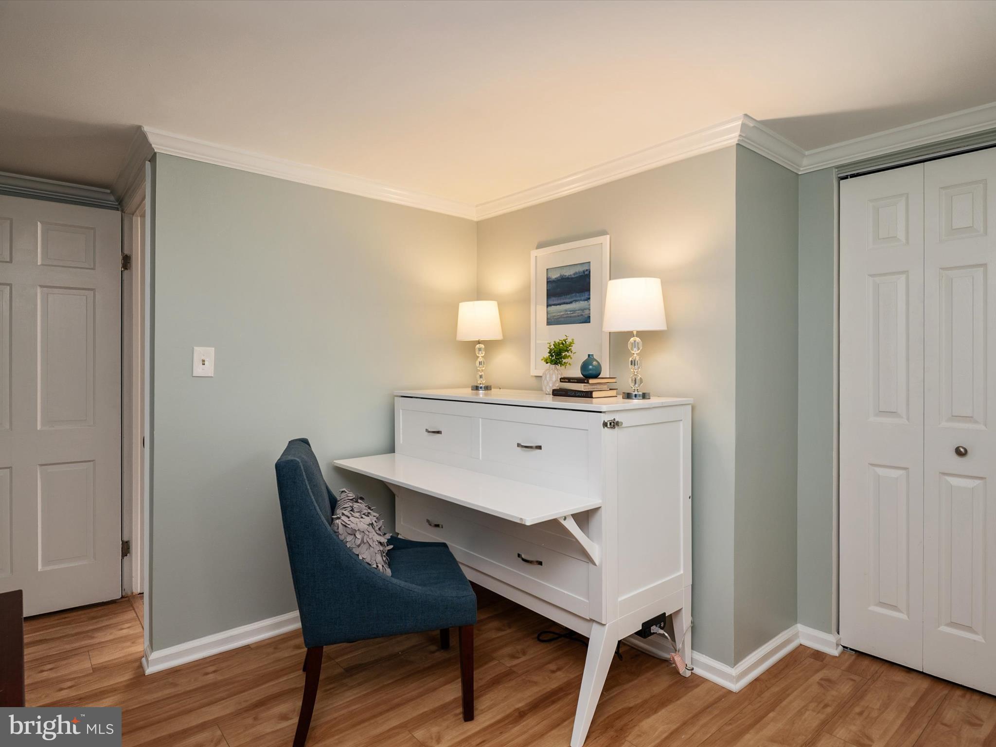 1589 Crofton Parkway Crofton, MD 21114 - Photo 27 of 60 a workspace with furniture and wooden floor