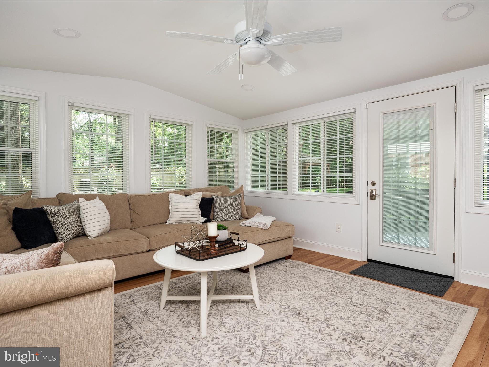 1589 Crofton Parkway Crofton, MD 21114 - Photo 31 of 60 a living room with furniture and a large window
