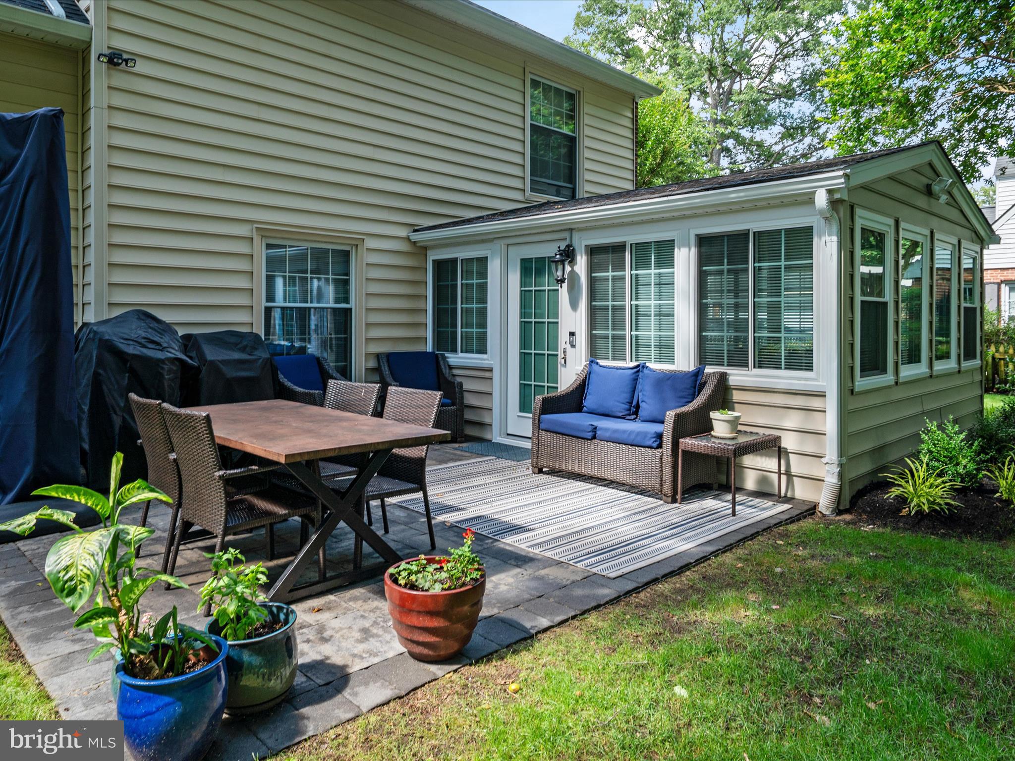 1589 Crofton Parkway Crofton, MD 21114 - Photo 33 of 60 a house view with a seating space and garden