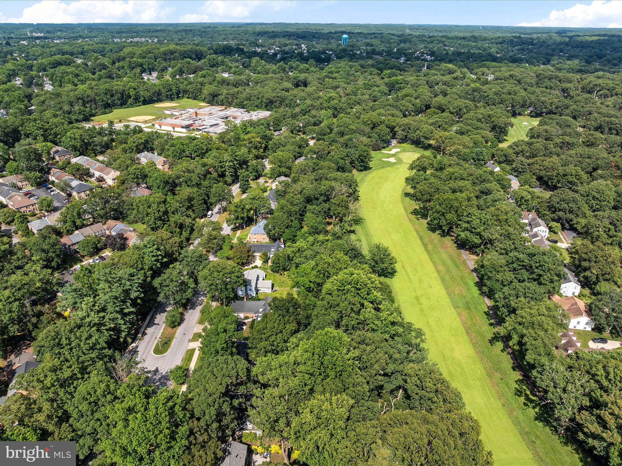 1589 Crofton Parkway Crofton, MD 21114 - Photo 52 of 60 a view of a city with lush green forest