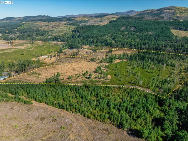 a view of a lake with mountains in the background