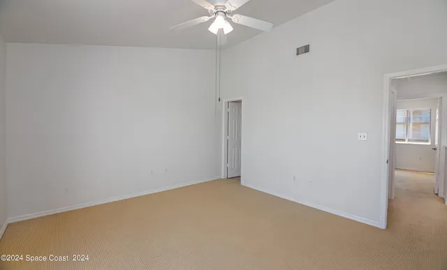 a bathroom with a sink a toilet a tub and shower