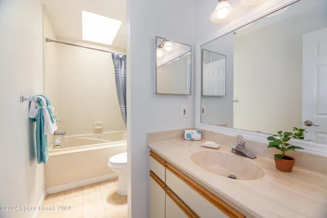 a view of a balcony with wooden floor