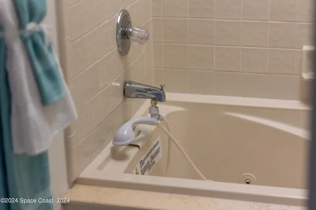 a view of balcony with yard